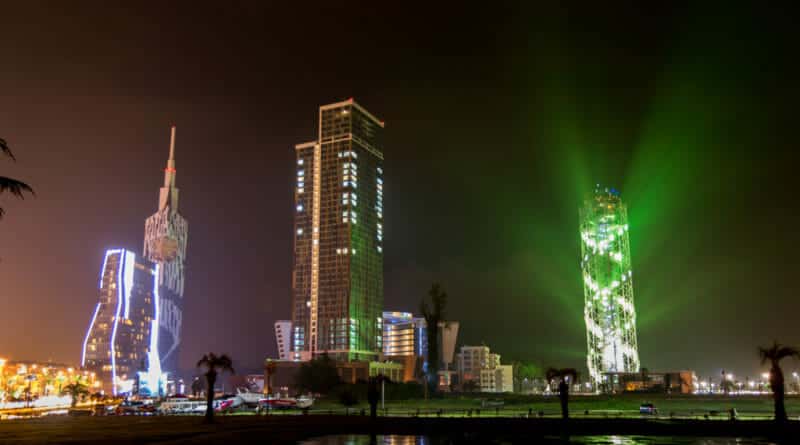 Skyline of Batumi in pouring rain by night.